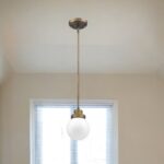Brushed Gold Metal Hanging with Round Glass Shade