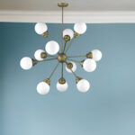 Bronze Sputnik Twelve Light Frosted Metal Dimmable Chandelier With Off White Shades